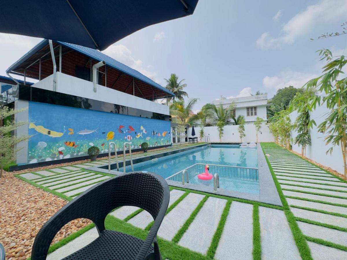 Achoos Residency Hotel Tiruvalla Exterior foto